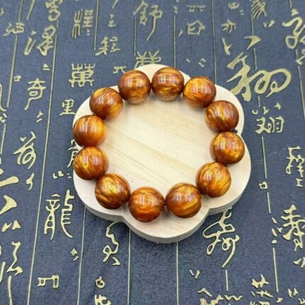 Factory wholesale gold silk sea willow hand string natural Buddha beads Wen play tourist attractions best selling men's and women's hand string supply