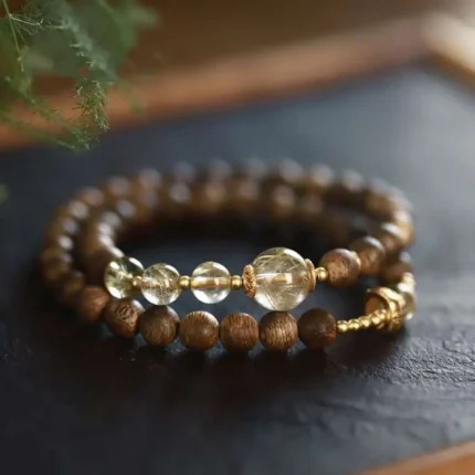 Sandalwood bead string paired with blonde crystal double loop bracelet